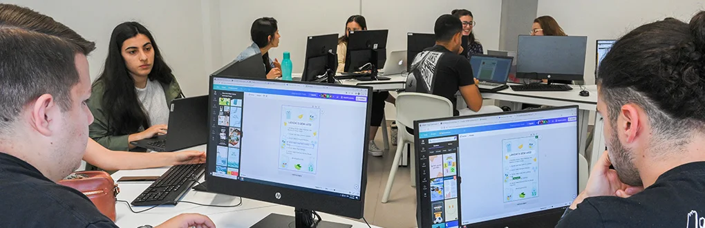 Students working on the computers