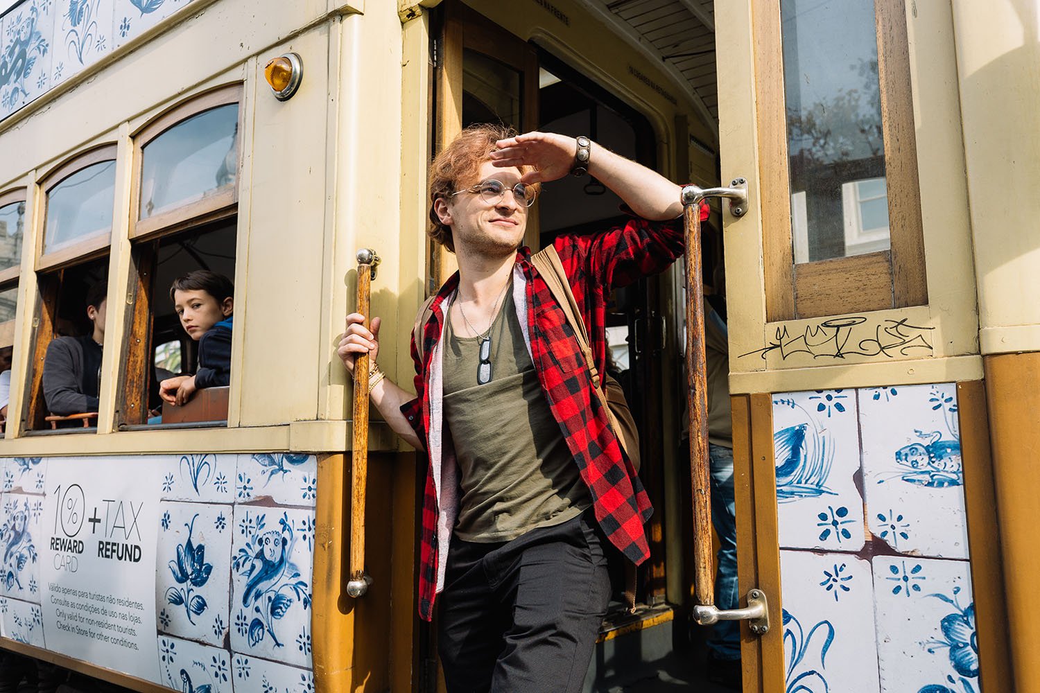An international student hitching a ride on Porto's classic tram
